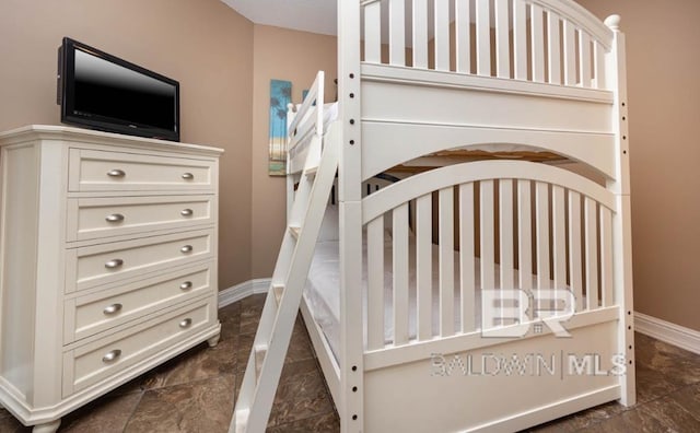 455 E Beach Blvd Unit 318, Gulf Shores, AL 36542 - unfurnished bedroom with baseboards