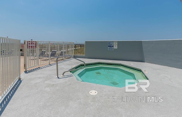 455 E Beach Blvd Unit 318, Gulf Shores, AL 36542 - view of pool with a hot tub