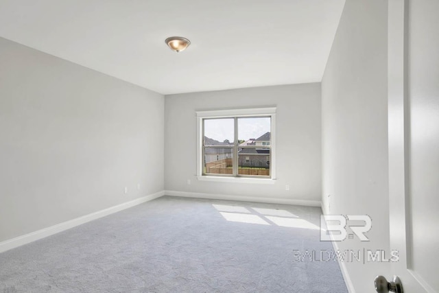 384 Garrison Blvd, Fairhope, AL 36532 - carpeted spare room featuring baseboards
