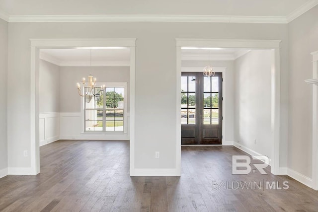 384 Garrison Blvd, Fairhope, AL 36532 - foyer entrance with a chandelier, dark wood-style floors, french doors, and crown molding