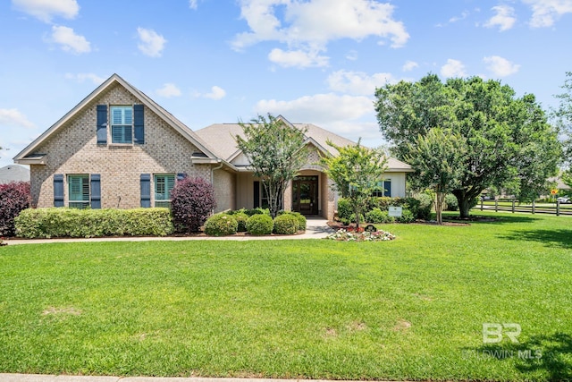 view of front of home with a front yard