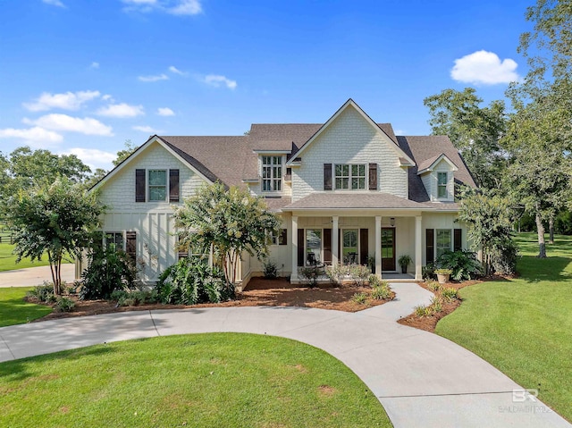 view of front of home featuring a porch and a front yard