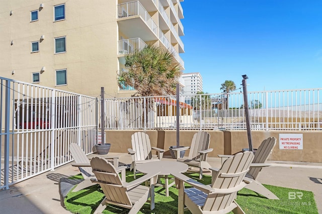 view of patio / terrace with fence