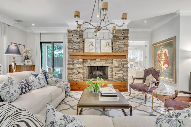 1106 Old County Rd, Daphne, AL 36526 - living room featuring crown molding, wood finished floors, a healthy amount of sunlight, and a fireplace