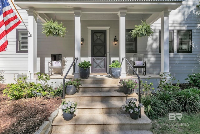 1106 Old County Rd, Daphne, AL 36526 - view of exterior entry with a porch