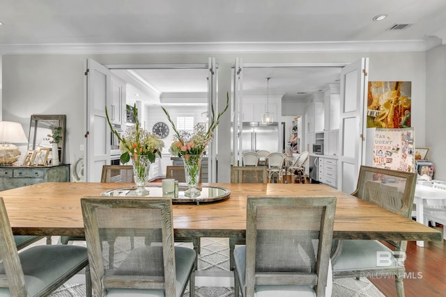 1106 Old County Rd, Daphne, AL 36526 - dining area with crown molding, recessed lighting, visible vents, and wood finished floors