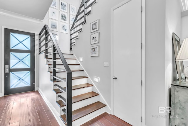 1106 Old County Rd, Daphne, AL 36526 - entrance foyer with baseboards, ornamental molding, wood finished floors, and stairway