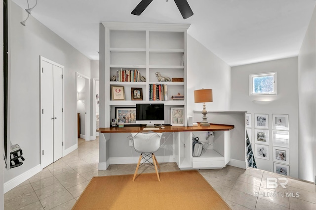 1106 Old County Rd, Daphne, AL 36526 - office area featuring baseboards, tile patterned flooring, a ceiling fan, and built in desk
