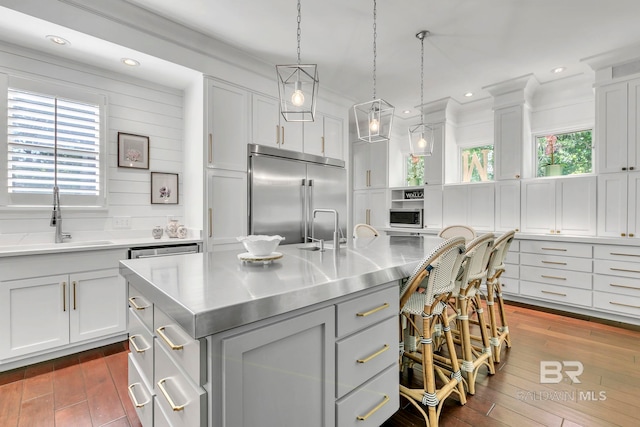 1106 Old County Rd, Daphne, AL 36526 - kitchen with a sink, stainless steel countertops, decorative light fixtures, dark wood-style floors, and stainless steel built in refrigerator