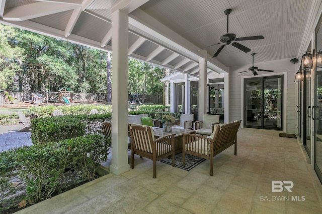 1106 Old County Rd, Daphne, AL 36526 - view of patio with fence, ceiling fan, and a playground