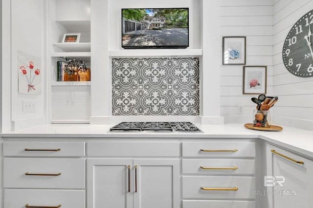 1106 Old County Rd, Daphne, AL 36526 - kitchen with stainless steel gas stovetop, light countertops, and white cabinetry