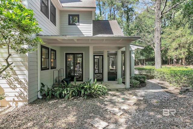 1106 Old County Rd, Daphne, AL 36526 - view of exterior entry featuring roof with shingles and a porch