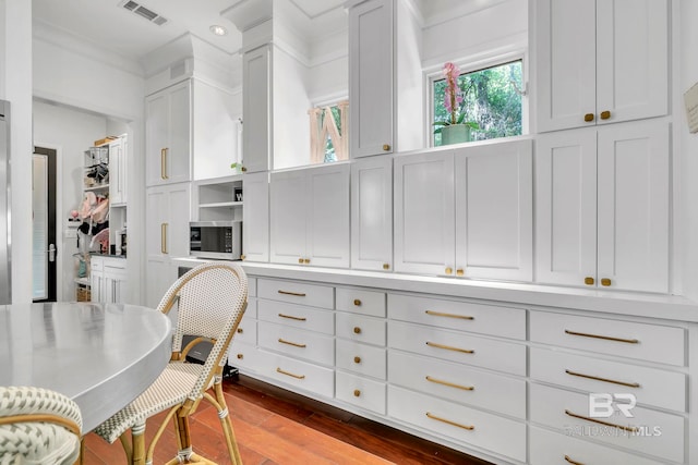 1106 Old County Rd, Daphne, AL 36526 - dining room with dark wood-style floors and visible vents