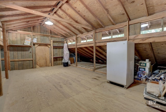 misc room with lofted ceiling