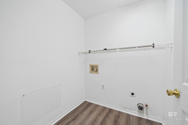 laundry area featuring dark wood-type flooring, laundry area, hookup for a washing machine, hookup for a gas dryer, and hookup for an electric dryer