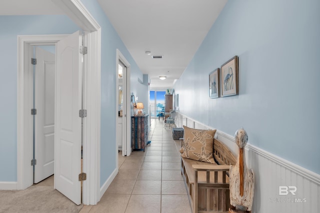 453 Dune Dr Unit 305, Gulf Shores, AL 36542 - hallway with light tile patterned flooring