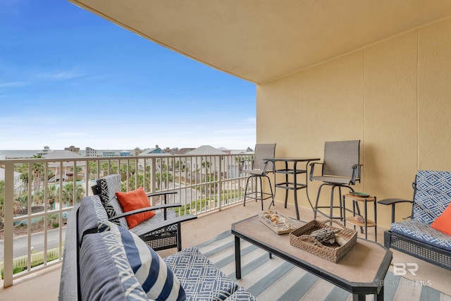 453 Dune Dr Unit 305, Gulf Shores, AL 36542 - balcony featuring an outdoor hangout area