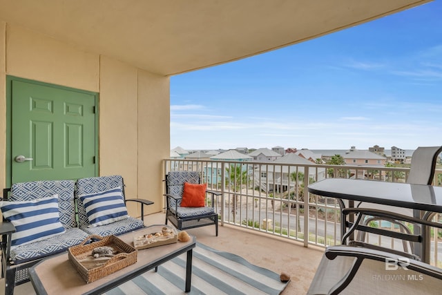453 Dune Dr Unit 305, Gulf Shores, AL 36542 - balcony featuring a residential view and outdoor lounge area