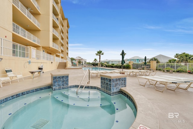 453 Dune Dr Unit 305, Gulf Shores, AL 36542 - community pool with a patio