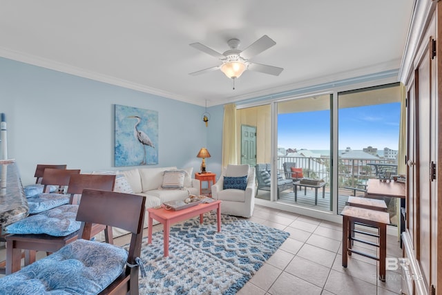 453 Dune Dr Unit 305, Gulf Shores, AL 36542 - living room with a ceiling fan, crown molding, and light tile patterned flooring