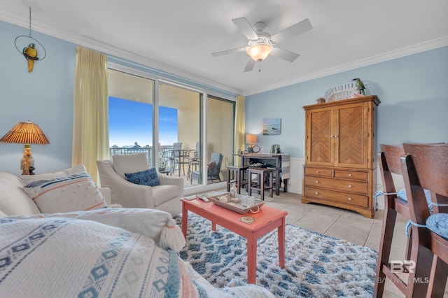 453 Dune Dr Unit 305, Gulf Shores, AL 36542 - living room with crown molding, a ceiling fan, and light tile patterned floors