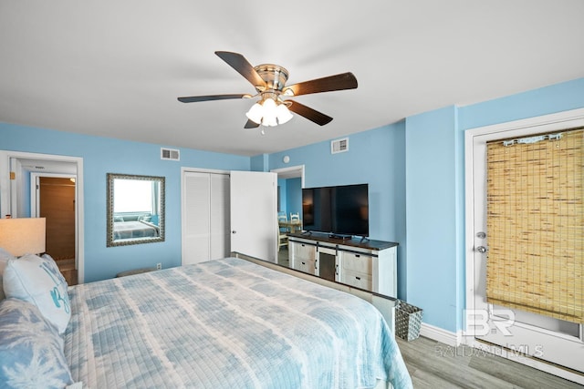 327 E Beach Blvd Unit 7C, Gulf Shores, AL 36542 - bedroom featuring wood finished floors, baseboards, and ceiling fan