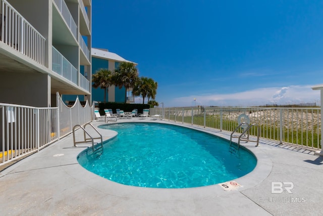 view of pool with a patio