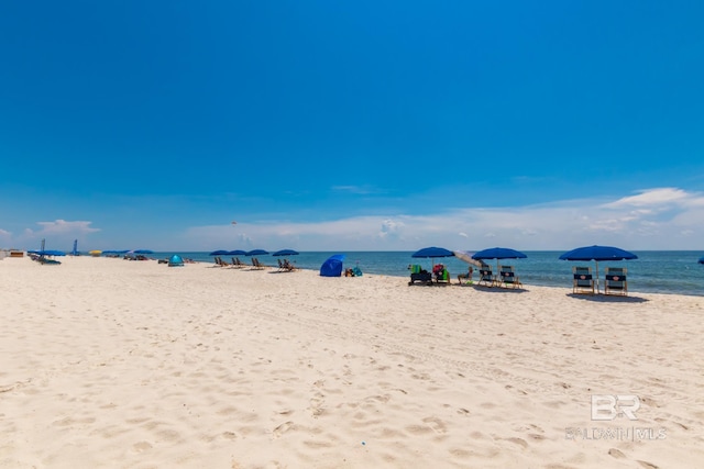 property view of water featuring a view of the beach