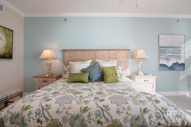 bedroom with ornamental molding