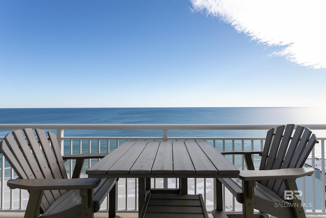 balcony featuring a water view