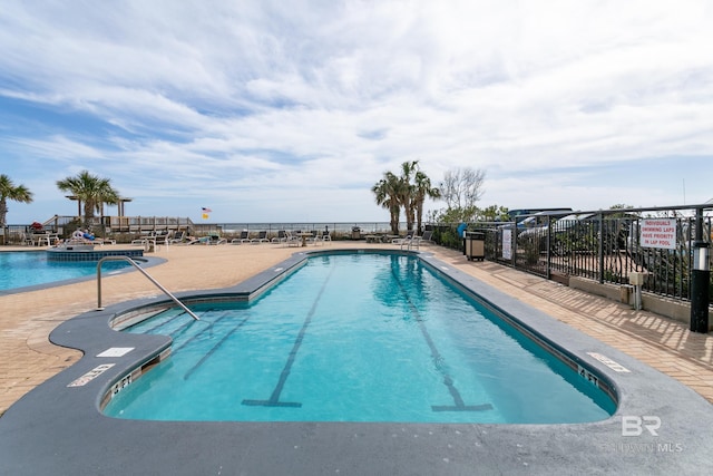 view of pool with a patio area