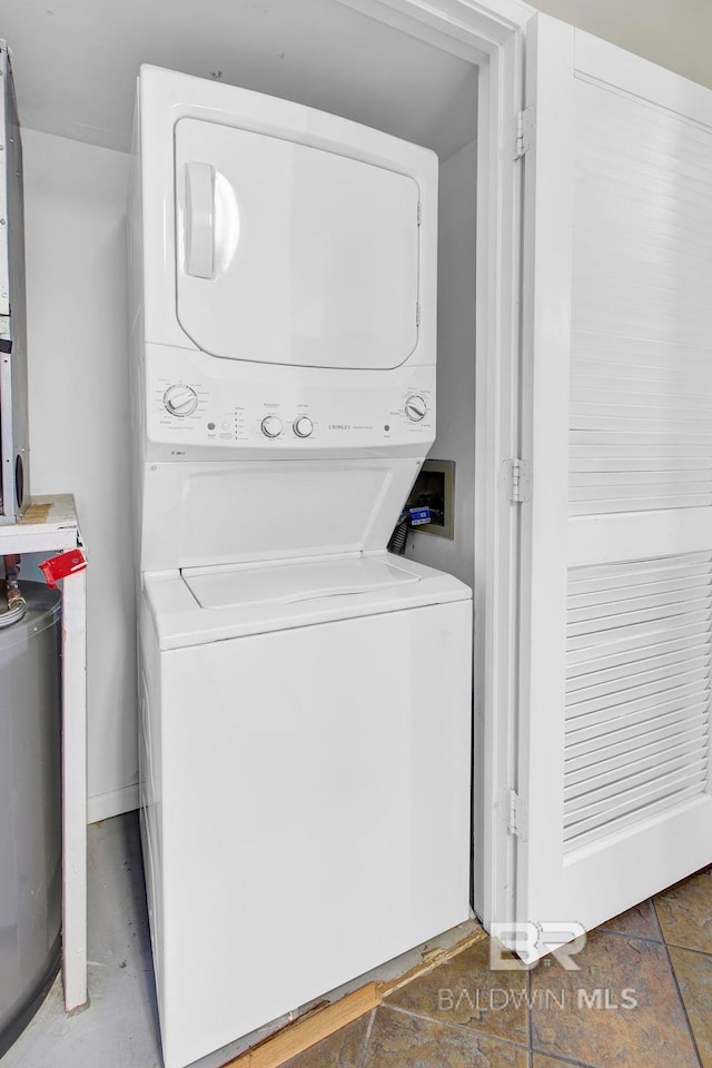 24568 Perdido Beach Blvd Unit 603, Orange Beach, AL 36561 - laundry area with stacked washer and clothes dryer