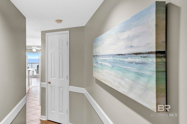 24568 Perdido Beach Blvd Unit 603, Orange Beach, AL 36561 - corridor featuring tile patterned floors and baseboards