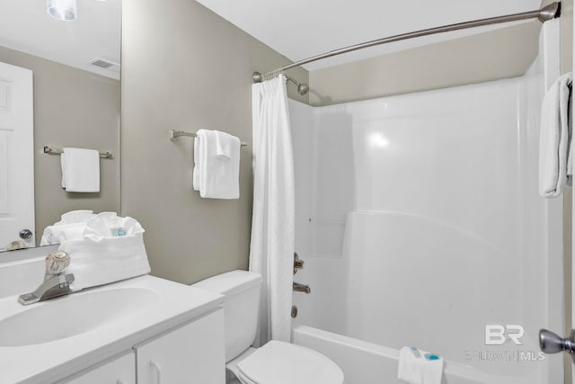24568 Perdido Beach Blvd Unit 603, Orange Beach, AL 36561 - full bathroom with vanity, shower / bath combination with curtain, and toilet