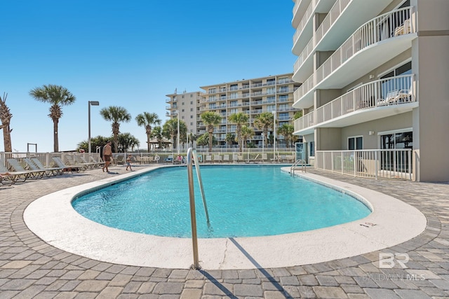 24568 Perdido Beach Blvd Unit 603, Orange Beach, AL 36561 - community pool with a patio area