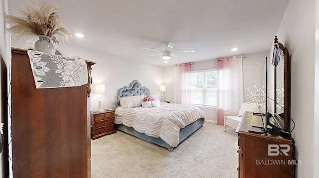 carpeted bedroom featuring ceiling fan