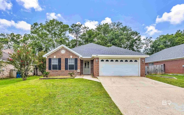 ranch-style home featuring concrete driveway, an attached garage, fence, a front yard, and brick siding