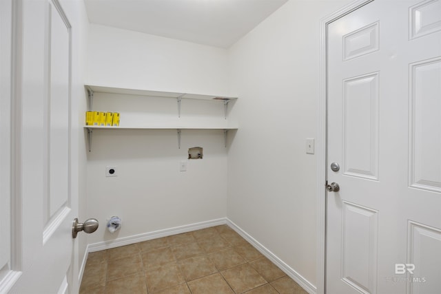 washroom featuring light tile patterned floors, hookup for a washing machine, laundry area, baseboards, and electric dryer hookup