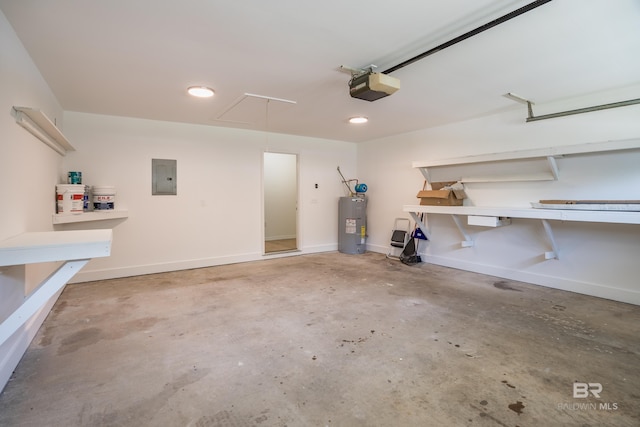 garage featuring a garage door opener, electric panel, baseboards, and electric water heater