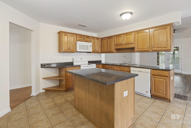 kitchen with light tile patterned flooring, white appliances, a sink, visible vents, and open shelves