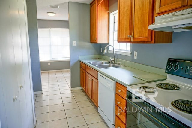 4366 Fathbrook Ln, Mobile, AL 36693 - kitchen with range with electric stovetop, white dishwasher, a sink, under cabinet range hood, and light countertops