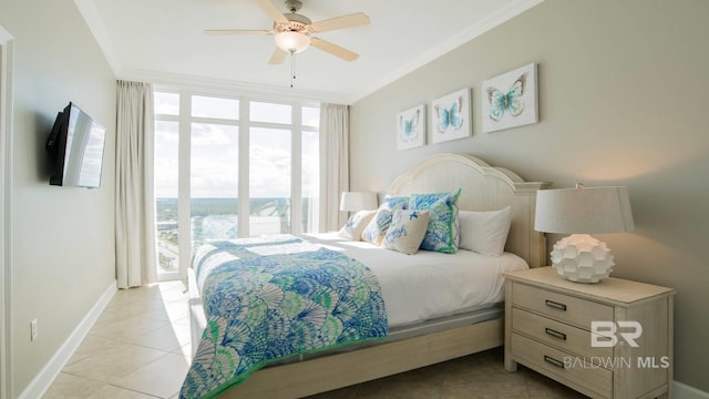 bedroom featuring crown molding, a wall of windows, ceiling fan, and light tile patterned flooring