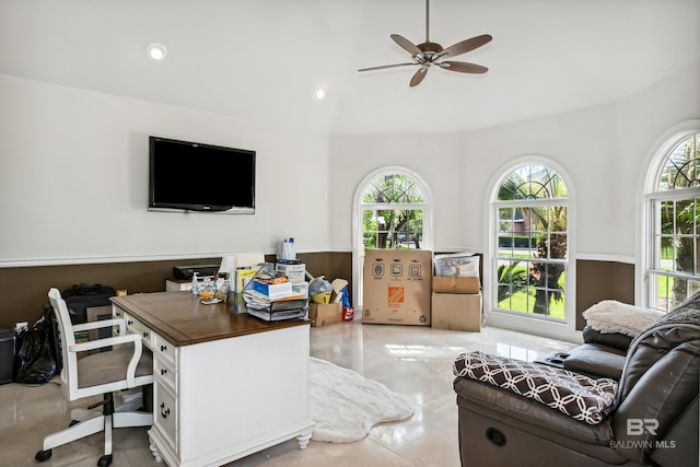 interior space featuring ceiling fan