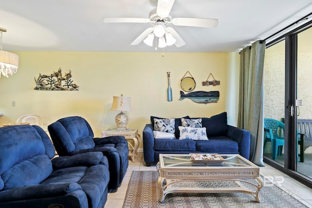 living room featuring ceiling fan and light tile patterned floors