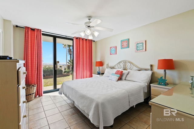 bedroom with access to exterior, ceiling fan, light tile patterned floors, and expansive windows