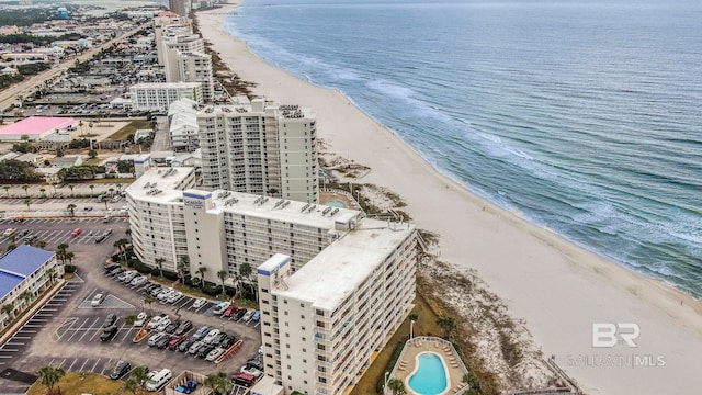 bird's eye view with a beach view and a water view