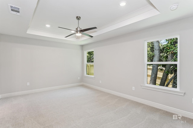 5885 Grotto Ave, Pensacola, FL 32507 - unfurnished room featuring a tray ceiling, light carpet, baseboards, and recessed lighting