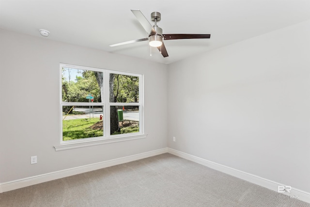 5885 Grotto Ave, Pensacola, FL 32507 - spare room with ceiling fan, light colored carpet, baseboards, and a smoke detector