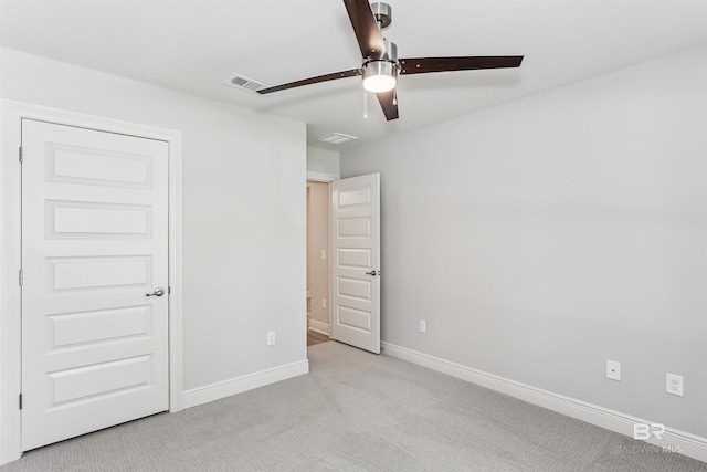 5885 Grotto Ave, Pensacola, FL 32507 - unfurnished bedroom featuring carpet, baseboards, and ceiling fan