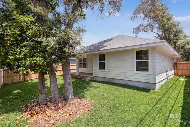 5885 Grotto Ave, Pensacola, FL 32507 - back of house with a shingled roof